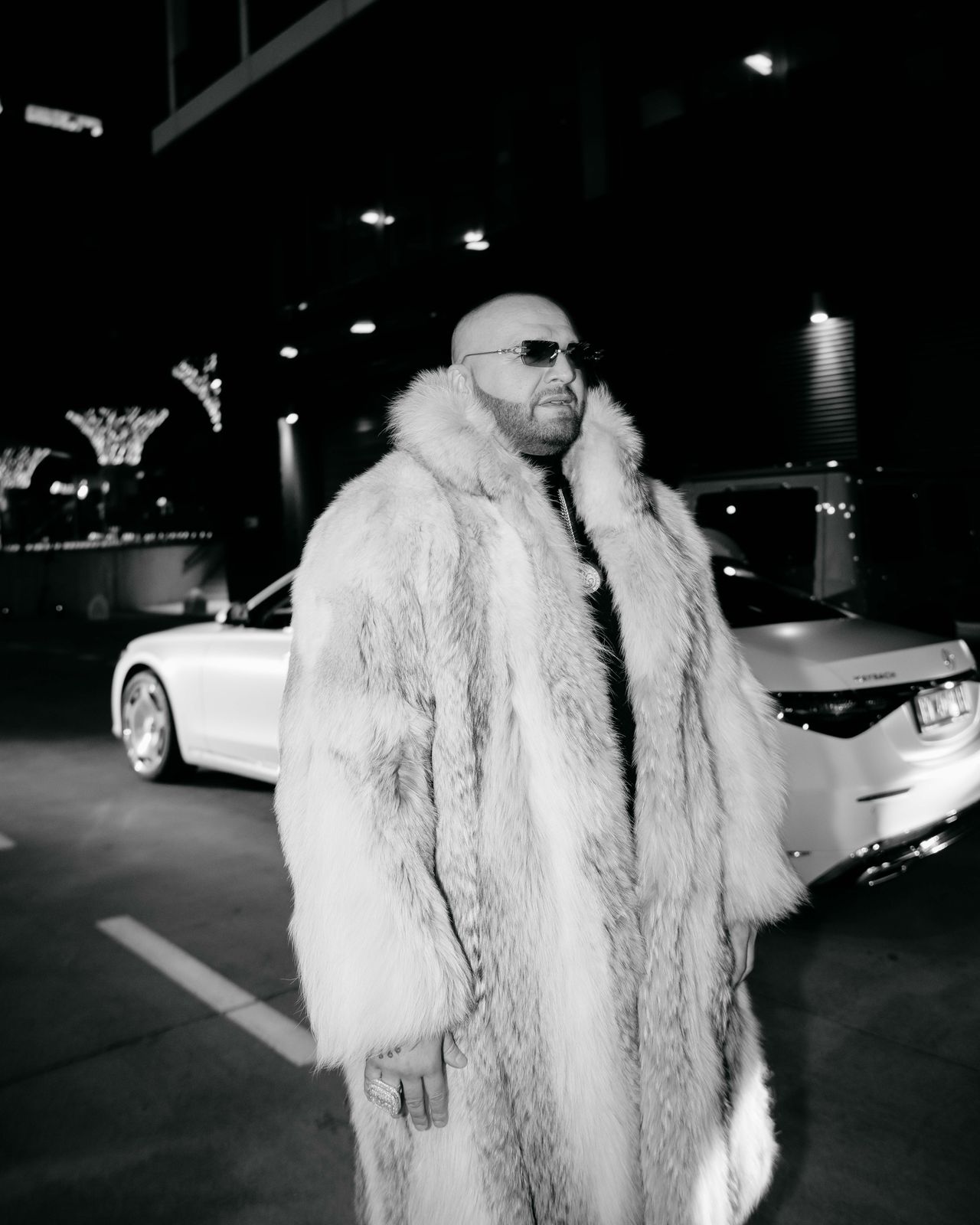 Rytmus Slovak rapper music artist portrait white fur coat beside Mercedes night shoot — Thomas Habr music photographer