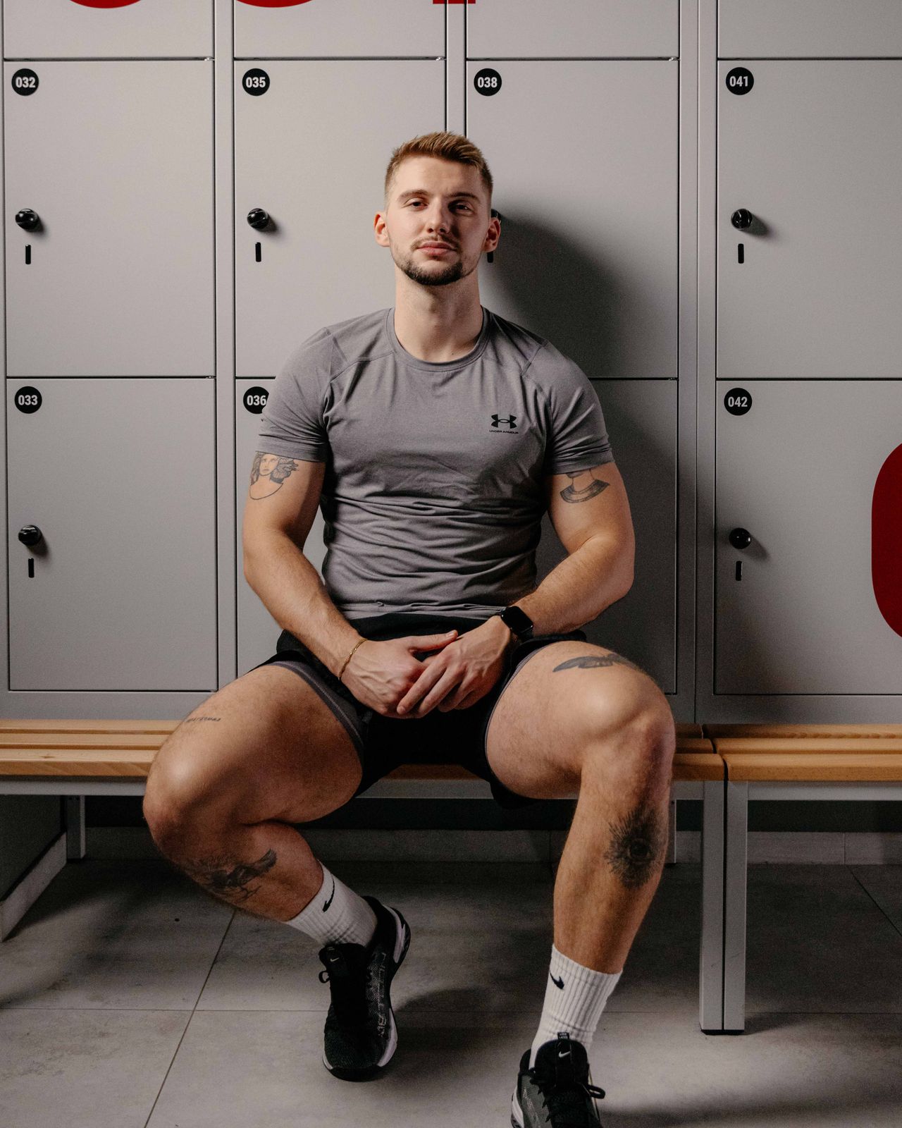 Sports brand commercial photography athlete in gym locker room — Thomas Habr brand photographer