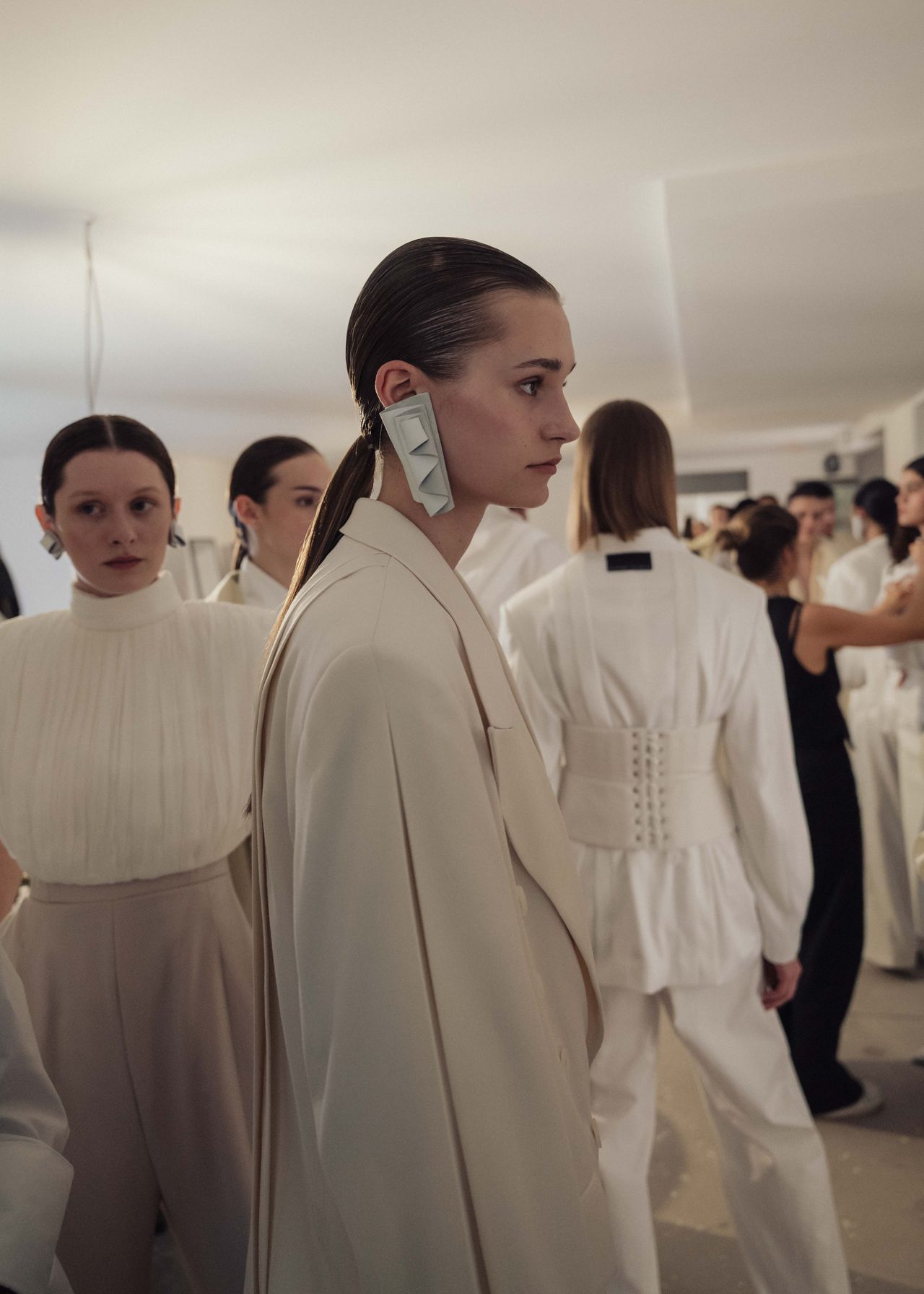 Fashion week backstage models in white flowing structured outfits — Thomas Habr fashion photographer
