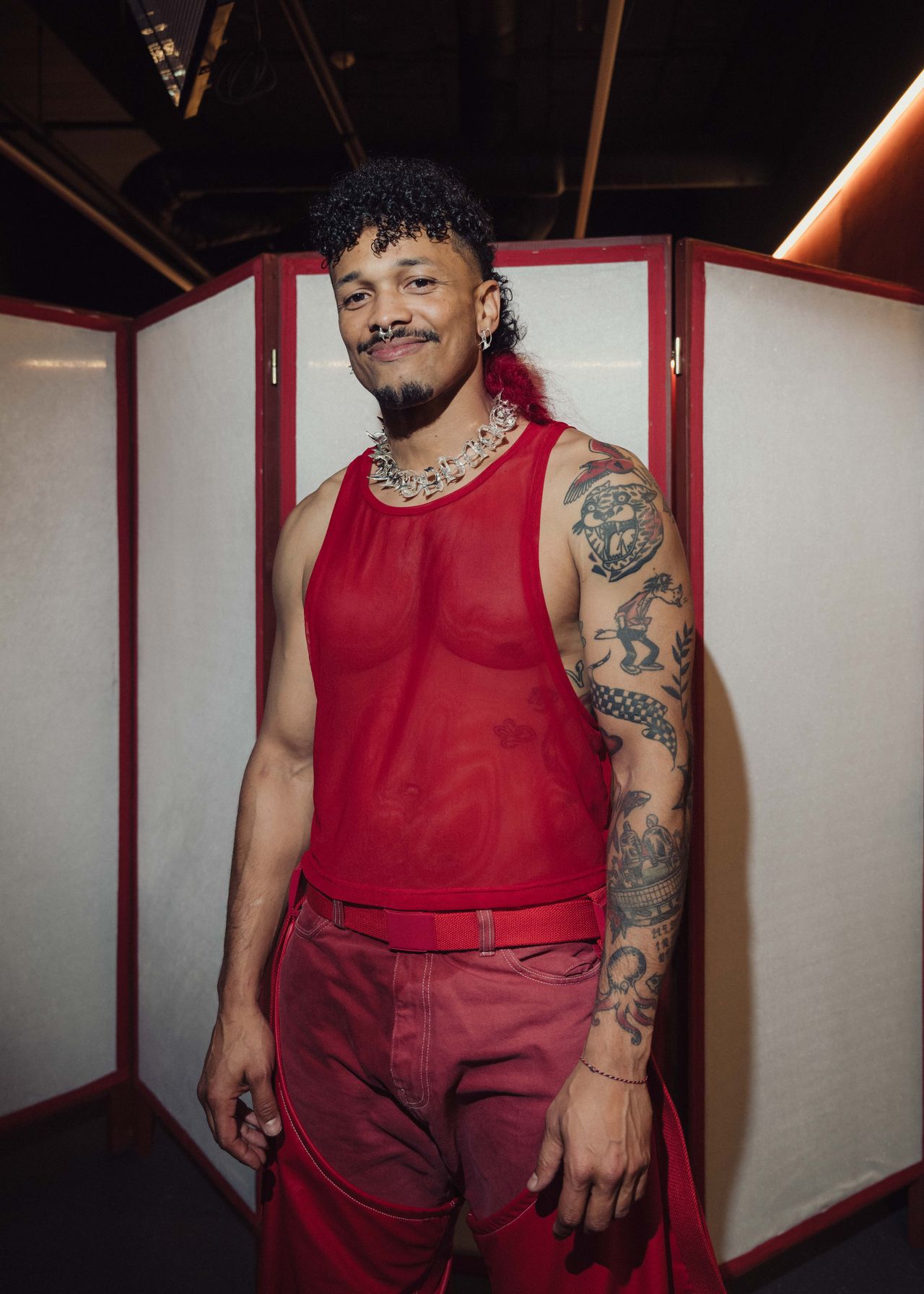 Ben Cristovao music artist portrait shoot red mesh top silver chain — Thomas Habr music photographer Prague