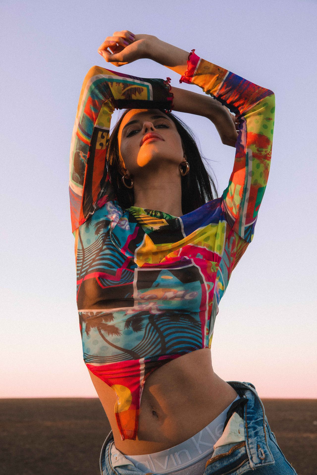 Colorful lifestyle fashion editorial woman in printed outfit at sunset — Thomas Habr international photographer