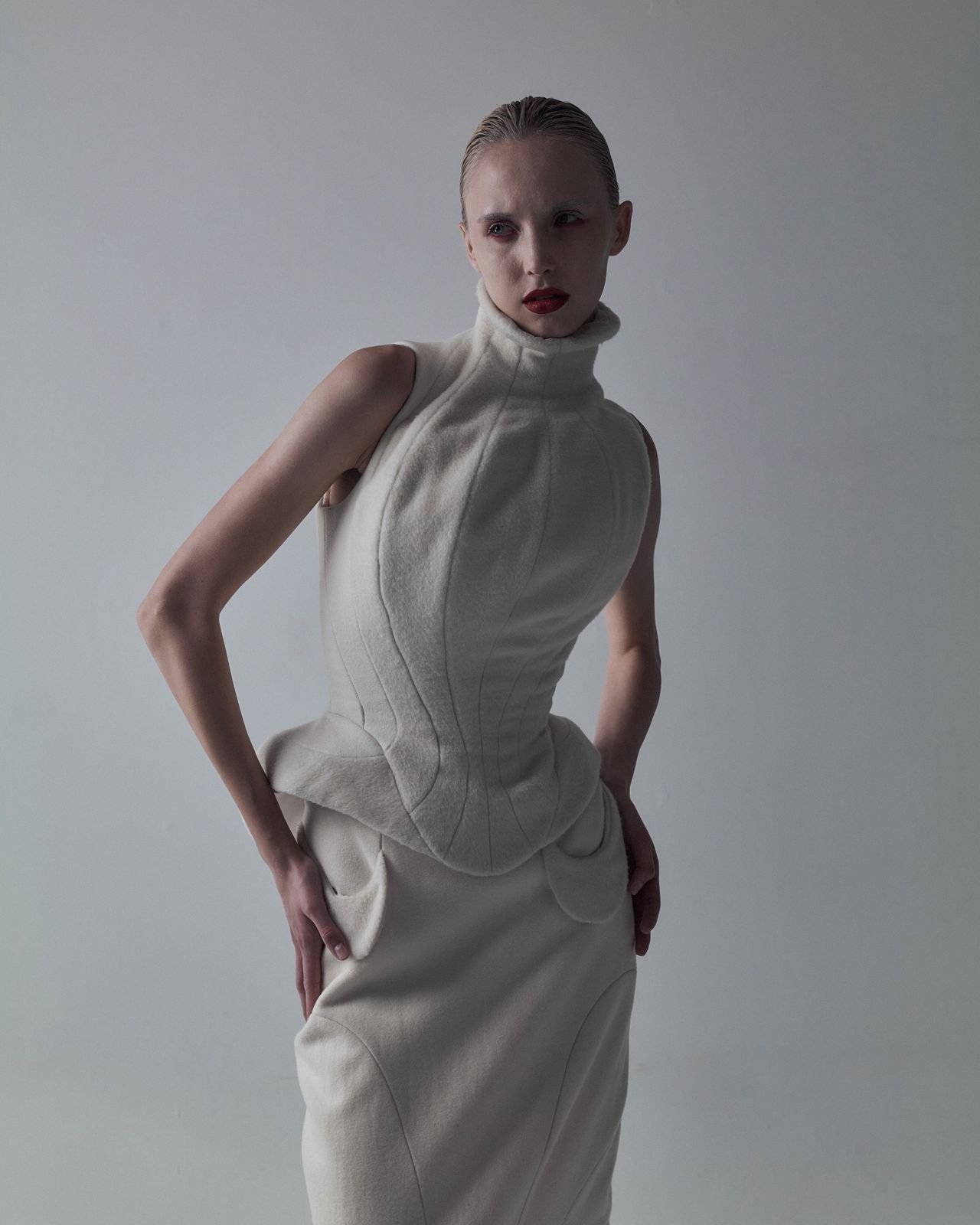 High fashion editorial model in white structured gown full body — Thomas Habr photographer
