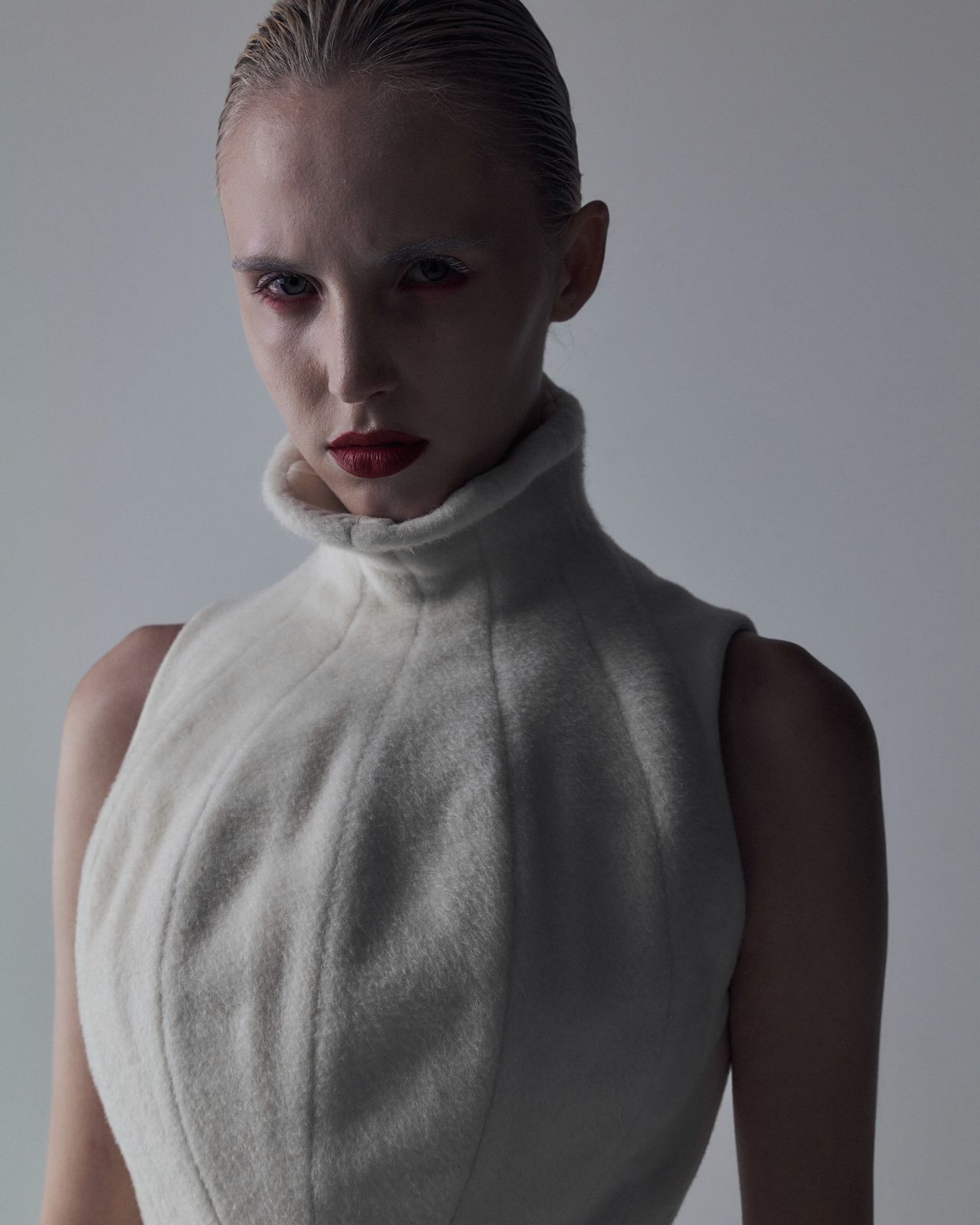 High fashion editorial model in white sculptural turtleneck — Thomas Habr fashion photographer