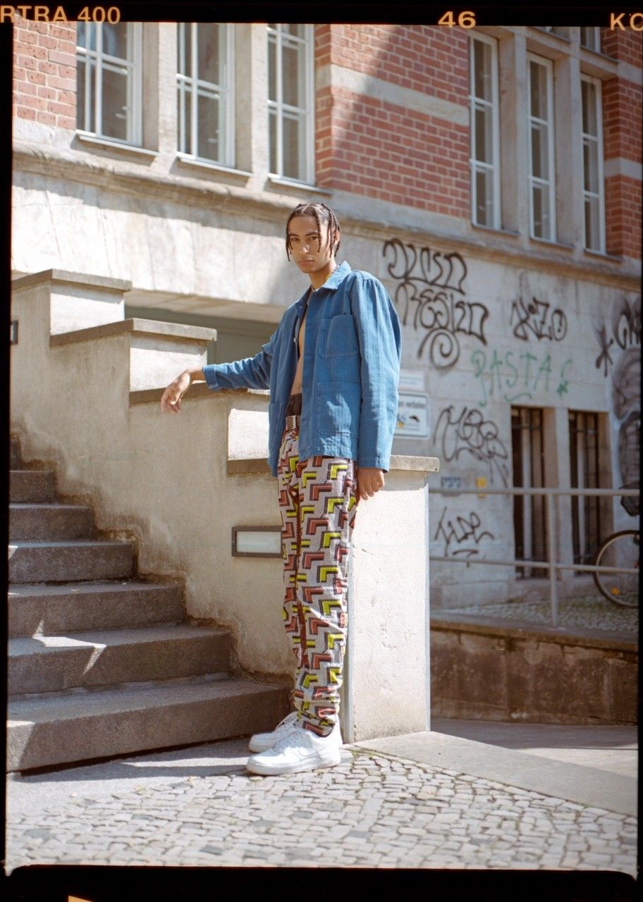 Film photography street style man on Berlin steps — Thomas Habr lifestyle photographer