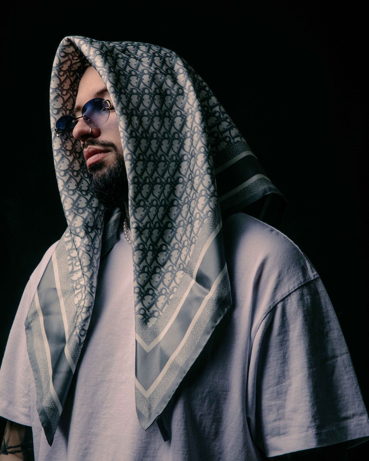Dior menswear editorial portrait man in Dior monogram hoodie — Thomas Habr fashion photographer