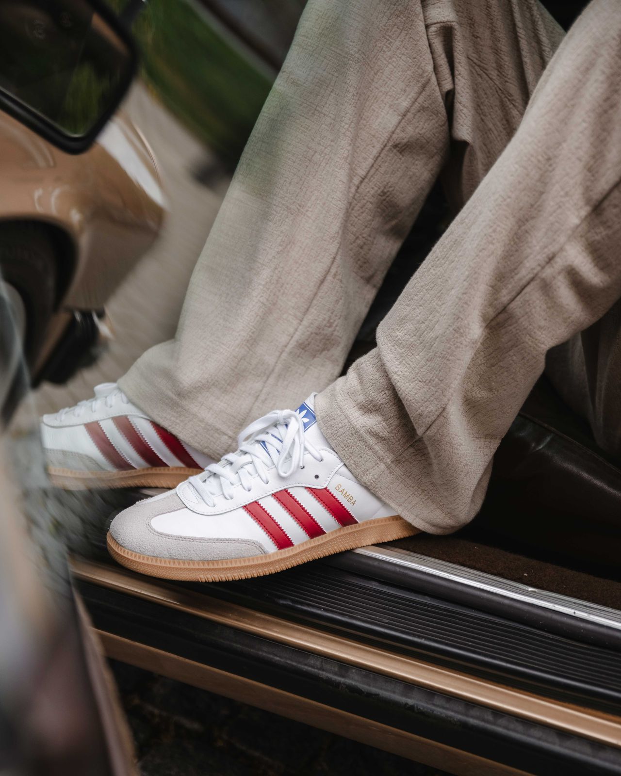 Adidas Samba sneaker close-up on car door lifestyle photography — Thomas Habr commercial photographer