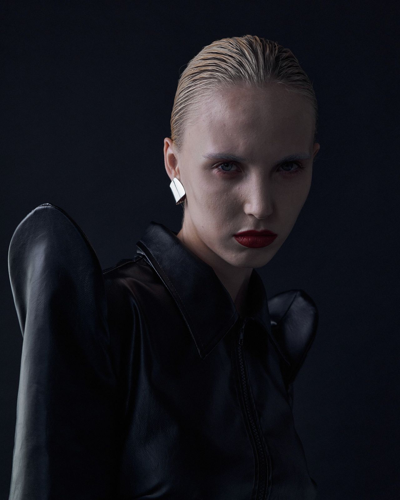High fashion editorial portrait model in black leather dramatic makeup — Thomas Habr fashion photographer