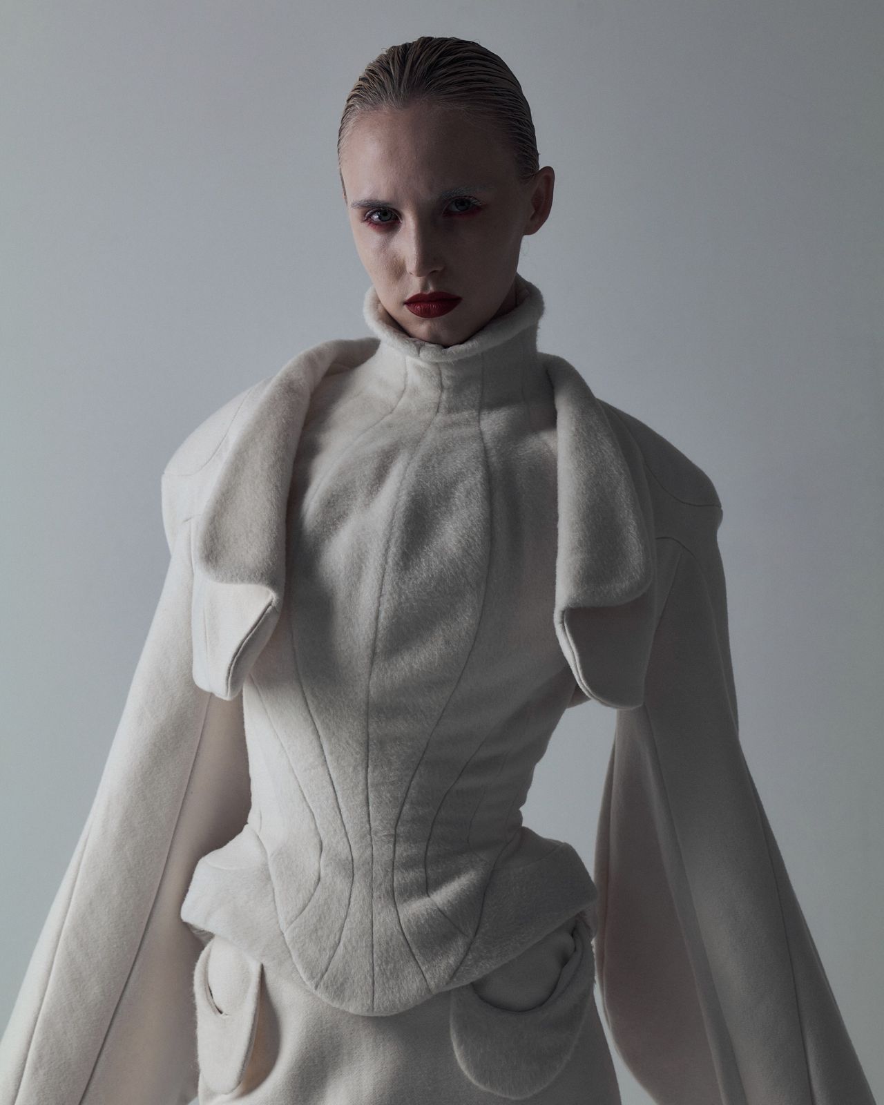 High fashion editorial model in white avant-garde corset dress — Thomas Habr fashion photographer