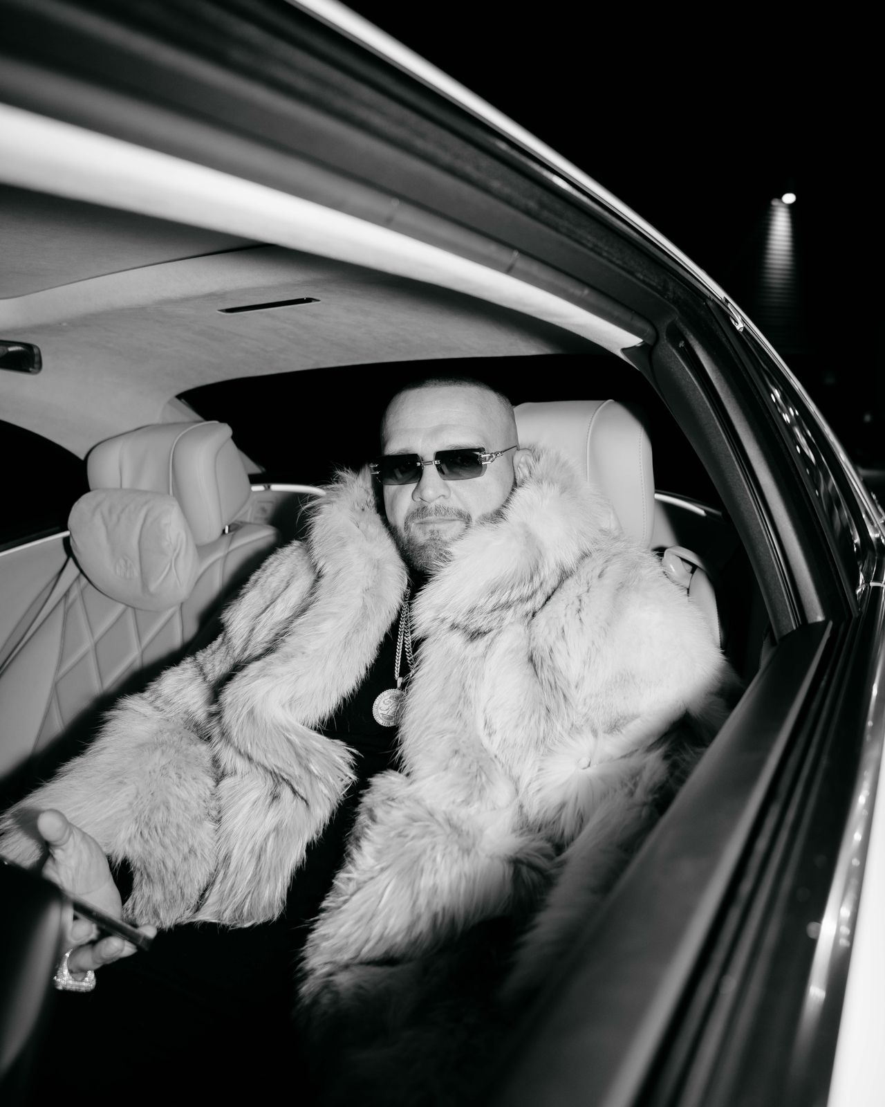 Rytmus slovak rapper inside luxury car portrait white fur coat sunglasses — Thomas Habr music photographer