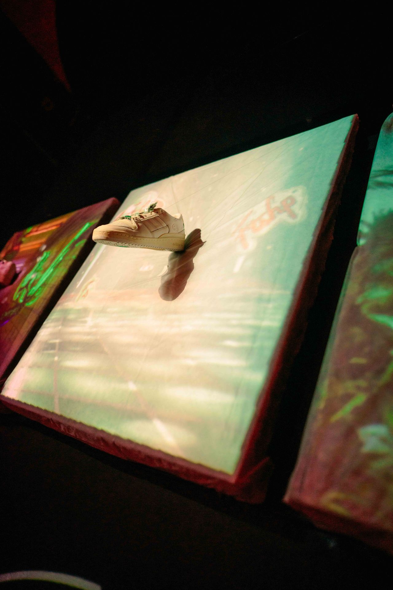 Luxury event photography man holding illuminated painting — Thomas Habr art event photographer