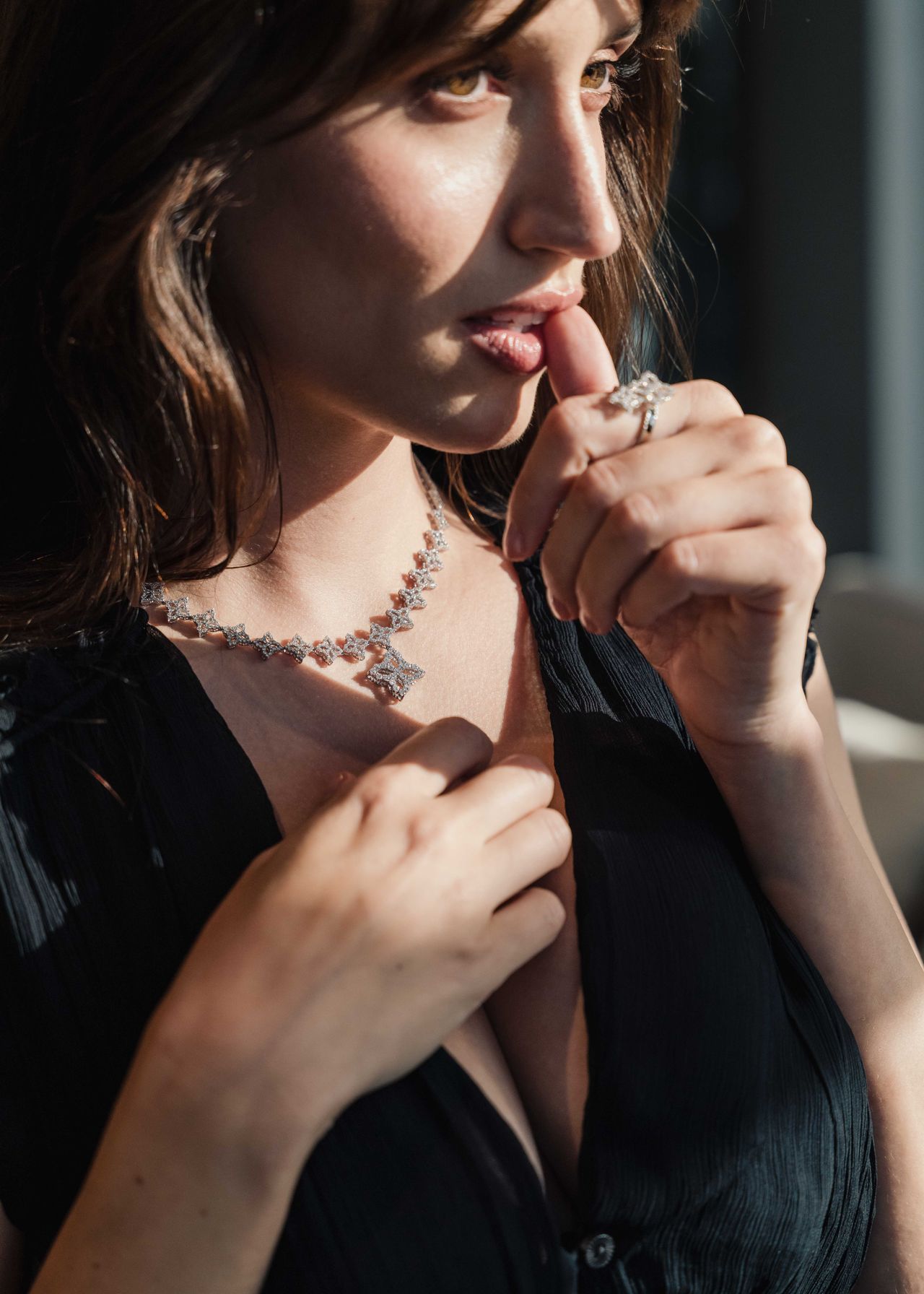 Luxury jewelry editorial woman in black dress with diamond necklace — Thomas Habr commercial photographer