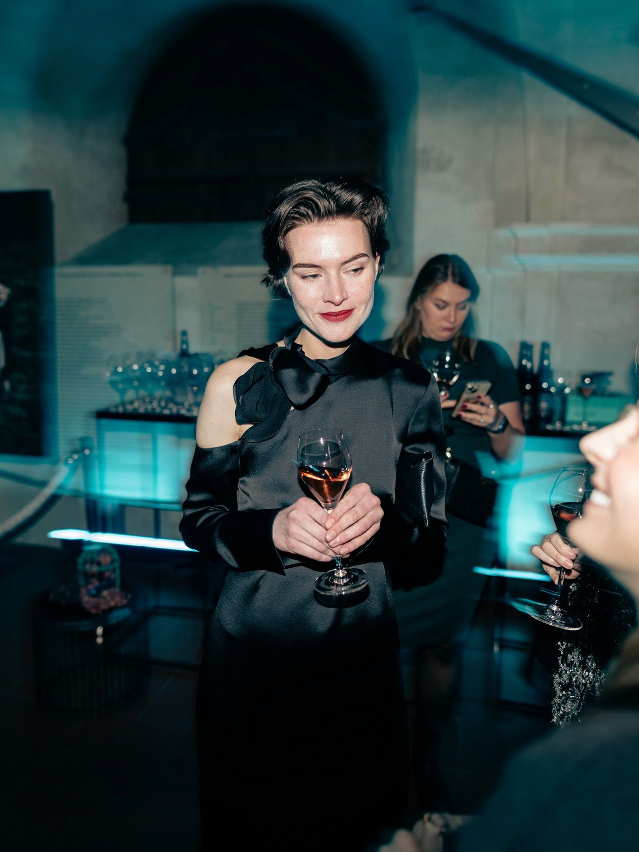 Luxury event photography woman with wine glass at gala — Thomas Habr photographer Prague